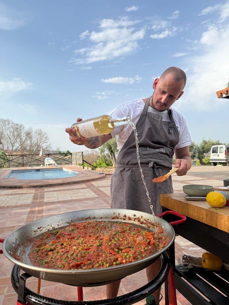 A large paella on the table
